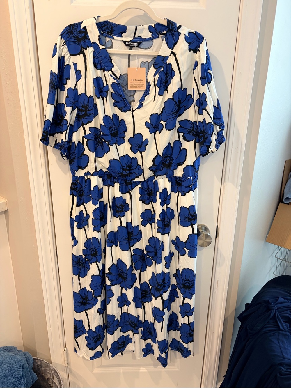 BloomChic White Midi Dress with Bold Blue Floral Print